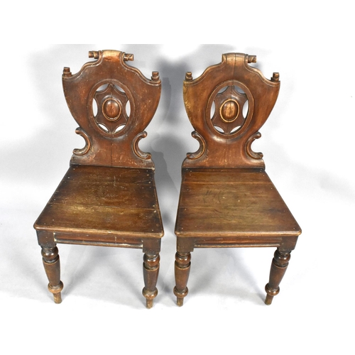 517 - A Pair of Victorian Hall Chairs with Carved and Pierced Shield Backs on Turned Supports, Some Condit... 