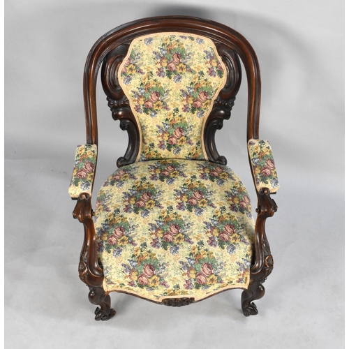 525 - A Late Victorian Mahogany Framed and Tapestry Armchair on  Scrolled Castor Supports