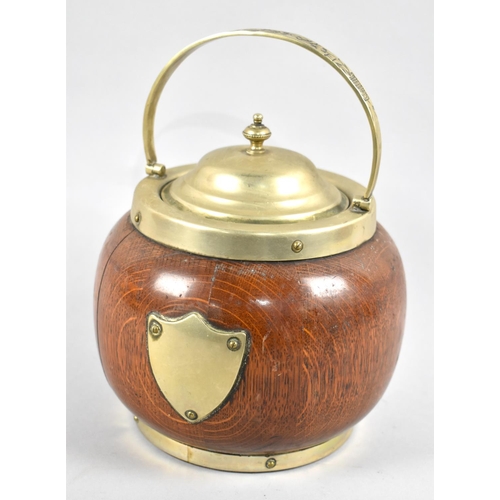 63 - An Edwardian Silver Plate and Oak Biscuit Barrel of Globular Form