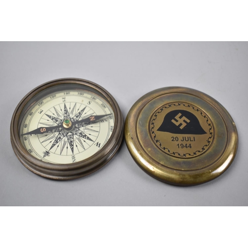 83 - A Reproduction Circular Brass Pocket Compass Decorated with German Helmet, Swastika and Dated 20 Jul... 