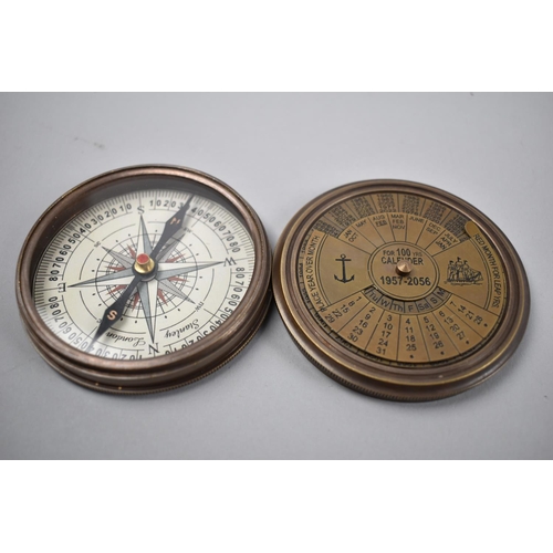 85 - A Reproduction Circular Brass Cased Compass, Lid Incorporating a 100 Year Calendar 1957-2056, 7.5cms... 