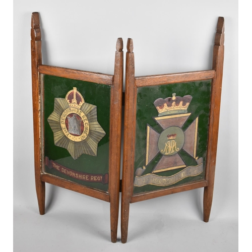 87 - A Hand Made Two Section Screen Decorated with Badges of Devonshire and Wiltshire Regiments. 66.5cms ... 