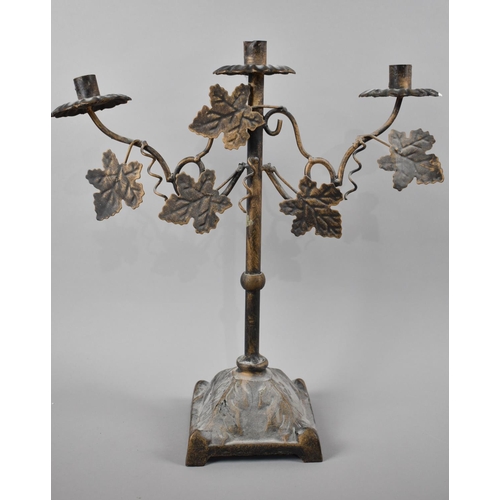 96 - A Modern Metal Three Branch Candelabra Decorated with Vine Leaves, 43cm High