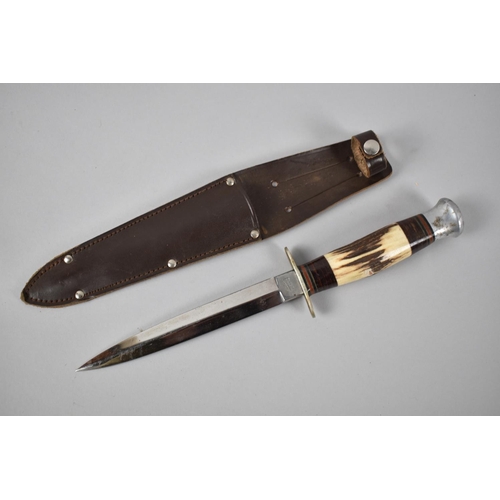 99 - A Mid 20th Century Stiletto Blade Knife by William Rodgers in Leather Scabbard