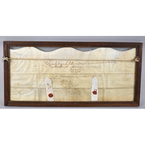 100 - A Framed Double Sided Indenture with Wax Seals, 58x28cms Overall