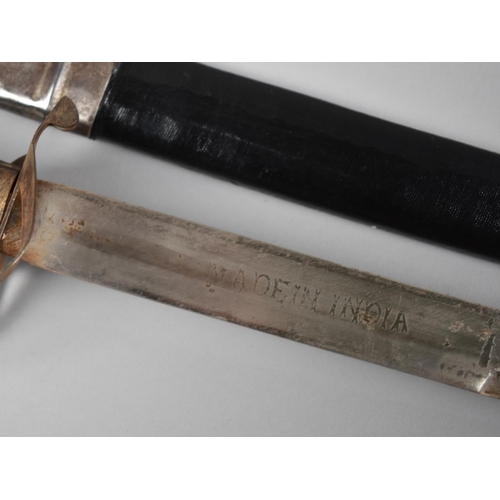 106 - A Mid 20th Century Indian Sikh Sword with Curved Blade Inscribed Made In India and Leather Scabbard