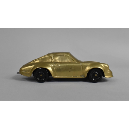 131 - An Italian Brass Model of a Porsche 911, 18cms Long