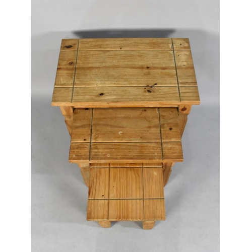 214 - A Nest of Three Far Eastern Softwood Tables, 66cms Wide