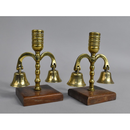 24 - A Pair of Brass Candlesticks formed From Horse Brass Bells and Plume Holders, 13.5cms High