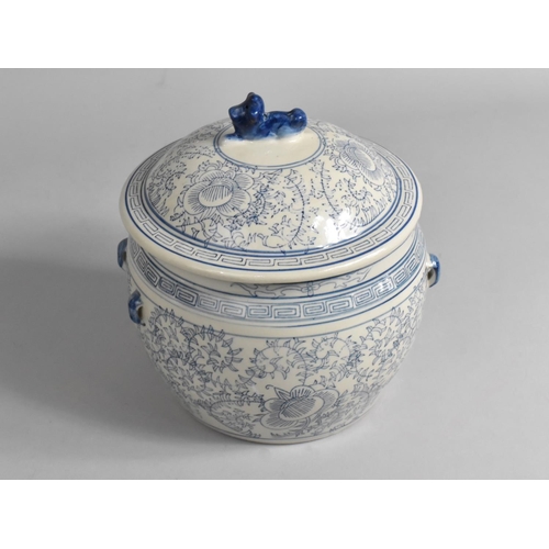 241 - A Modern Blue and White Kamcheng Pot and Cover with Temple Lion Finial, 22cm high