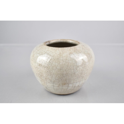 247 - A Chinese White Crackle Glazed Pot of Squat Globular Form, 7.5cms High