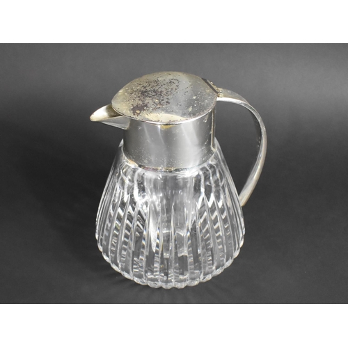 276 - A Large Heavy Glass and Silver Plated Jug with Inner Ice Chamber 23cm high