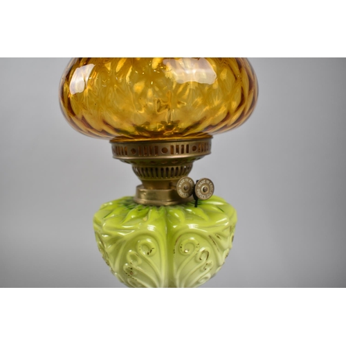 34 - A Late Victorian Oil Lamp with Brass Support, Green Ceramic Reservoir, Coloured Shade and Plain Chim... 