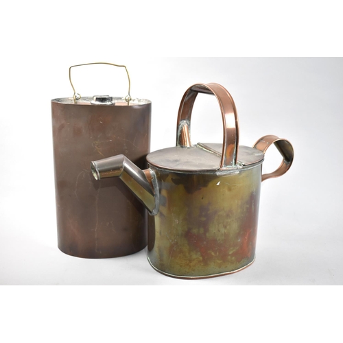 41 - A Late 19th Century Copper Water Jug together with an Oval Copper Canister, 92cms High