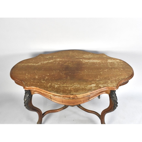 425 - A Shaped Oval Top Centre Table with Carved Cabriole Supports, Water Damaged Top, 1298x82cms