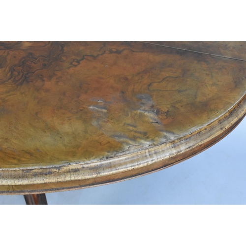 429 - A Late Victorian Burr Walnut Oval Snap Top Breakfast Table on Carved Scrolled Seat, 144cms by 102cms... 