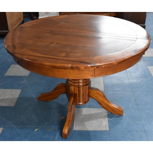 430 - An Indonesian Circular Extending Dining Table, 112cms Diameter