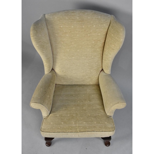 439 - A Modern Upholstered Wing Armchair