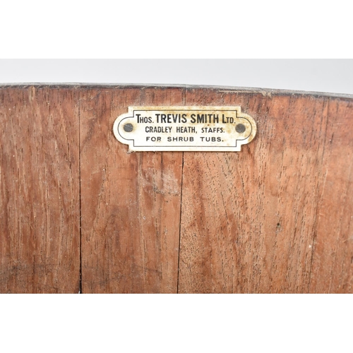 78 - A Copper Banded Shrub Tub on Three Feet with Two Carrying Handles by Trevis Smith Ltd, 28cms Diamete... 