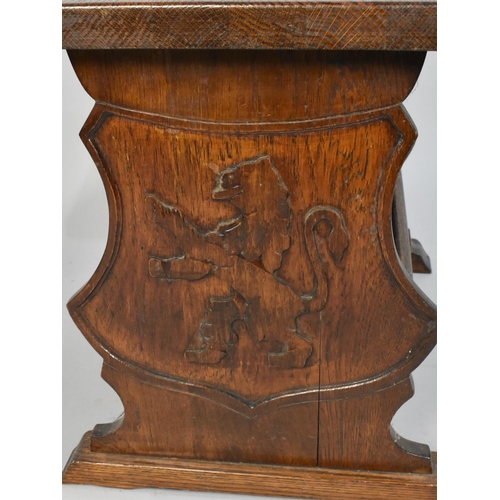 83 - A Mid 20th Century Oak Magazine Table, End Panels Decorated in  Relief with Scottish Lion Rampant, 5... 