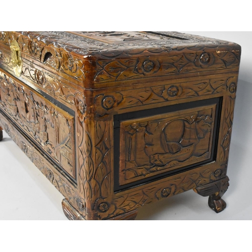 86 - A Modern Oriental Carved Camphor Wood Lift Top Chest, 87cms Wide