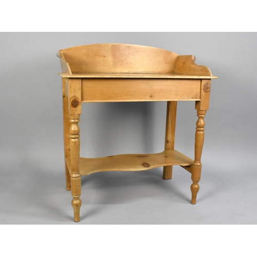 128 - A Stripped Pine Galleried Wash Stand with Stretcher Shelf, 76cms Wide