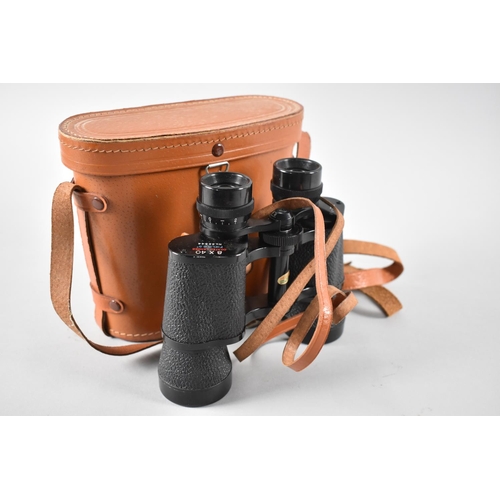 136 - A Pair of Leather Cased 8x40 Field Binoculars