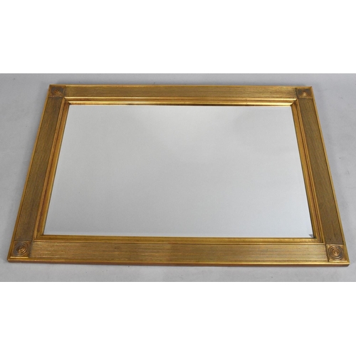 201 - A Modern Gilt Framed Rectangular Wall Mirror, 109x79cms