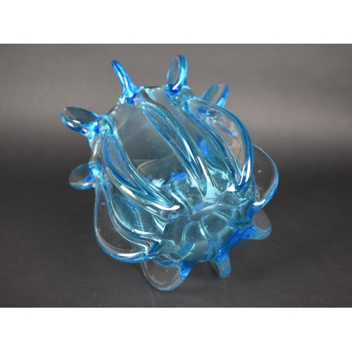 369 - An Art Glass Blue Tone Vase of Shaped Form Having Lappet Finials, 20cm high