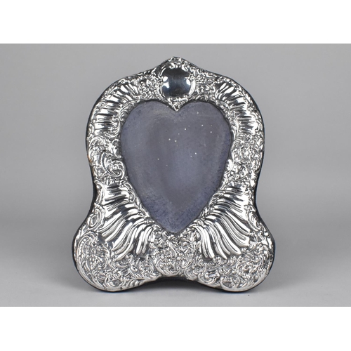 379 - A Silver Photo Frame of Shaped Form Having Scrolled Foliates and Heart Shaped Opening, London Hallma... 