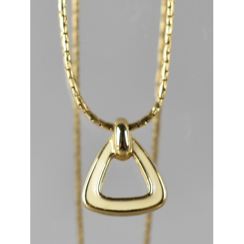 391 - A Christian Dior Necklace, Gilt and White Enamel Triangular Pendant on Chain with Hanging Tag for Ch... 