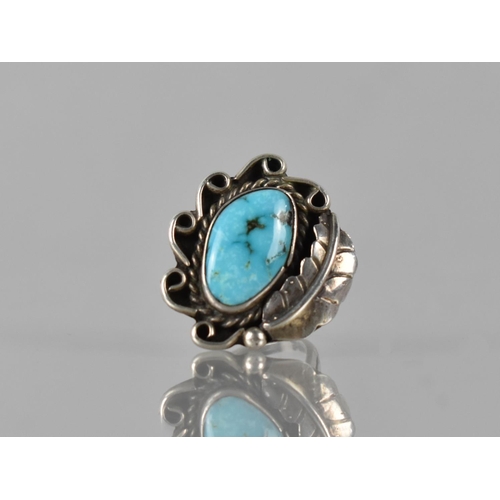 407 - A Large Turquoise Mounted Navajo Ring in Unmarked White Metal, Irregular Turquoise Cabochon Measurin... 