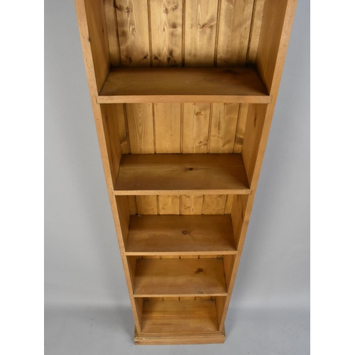 462 - A Modern Pine Narrow Four Shelf Bookcase, 49cms Wide and 180cms High