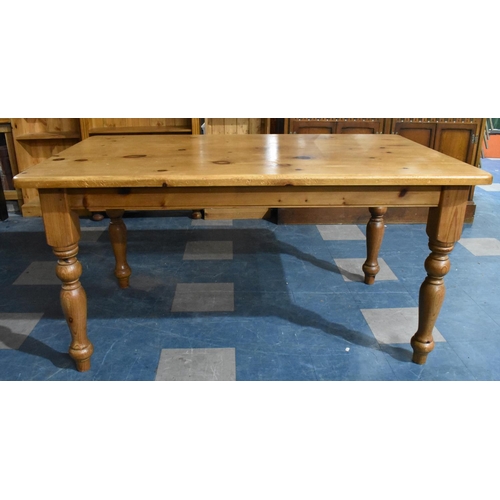 466 - A Modern Rectangular Pine Kitchen Table and Six Chairs, 151x90cms