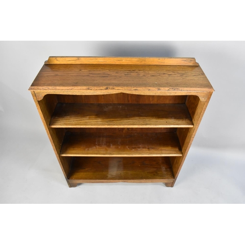 473 - An Edwardian Oak Three Shelf Open Bookcase with Galleried Top, 84cms Wide