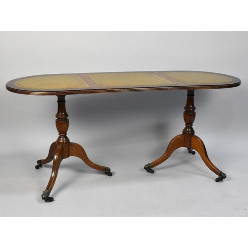 483 - A Mid/Late 20th Century Mahogany Oval Coffee Table with Tooled Leather Panel and Tripod Supports, 12... 