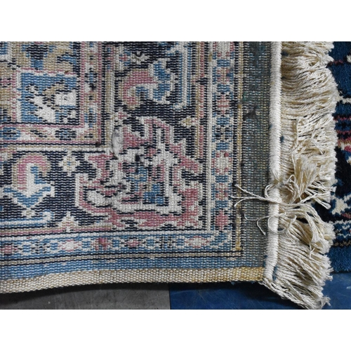 486 - A Patterned Shirvana Patterned Rug on Blue Ground, 147x91cms