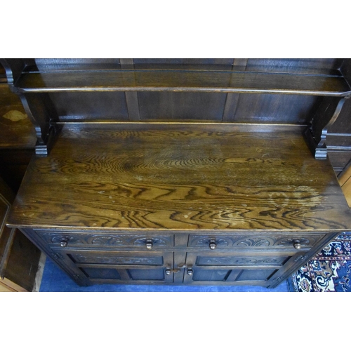 489 - A Mid 20th Century Oak Dresser with Two Drawers, Cupboard Base, Raised Shelf Plate Rack, 122cms Wide