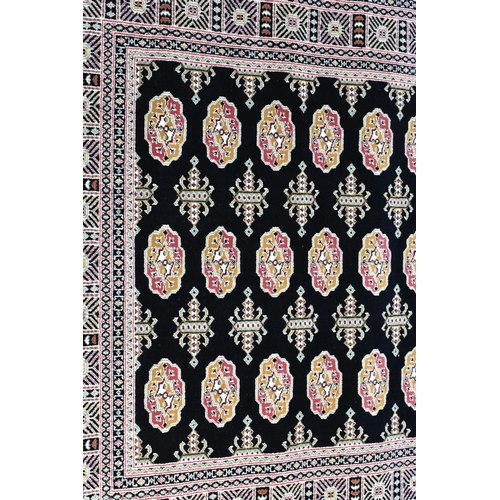 510 - A Modern Patterned Rug, 168x120cms