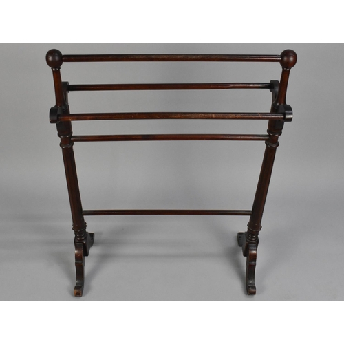 68 - A Mahogany Victorian Style Towel Rail with Turned Reeded Supports, 66cms Wide