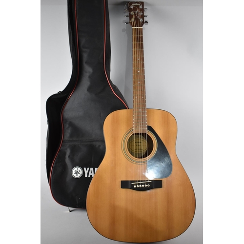 70 - A Late 20th Century Yamaha F310 Acoustic Guitar in Canvas Carrying Bag