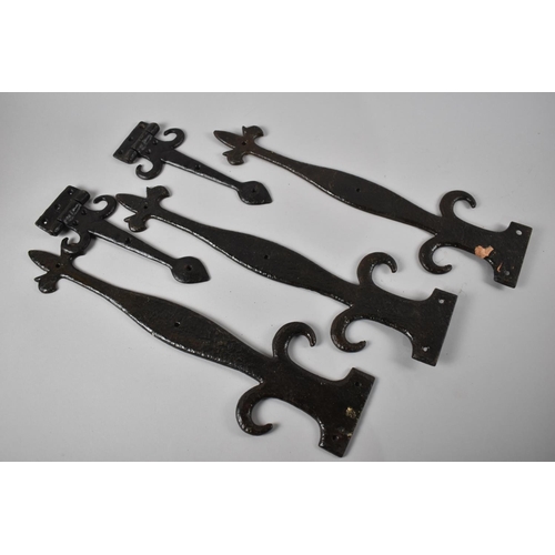 76 - A Collection of Reproduction Cast Iron Door Furniture