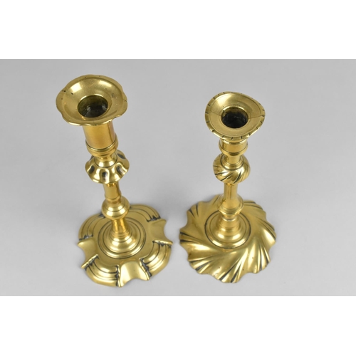 85 - A Pair of Georgian Brass Candlesticks with Pushers, Candleholders Somewhat Distorted, 23cms High