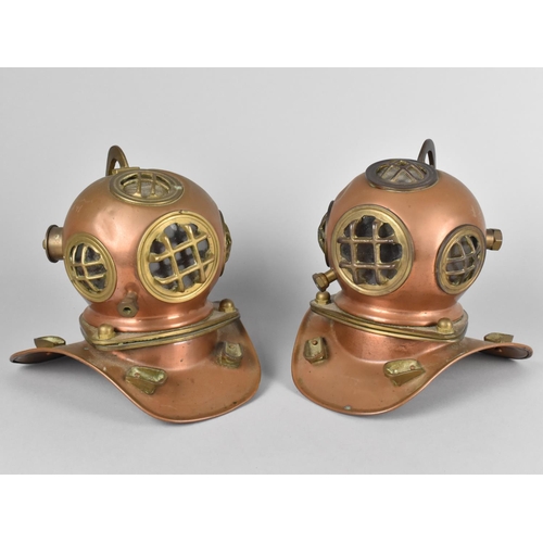 103 - A Pair of Reproduction Models in Copper and Brass Depicting  Vintage Divers Helmets, 18cms High