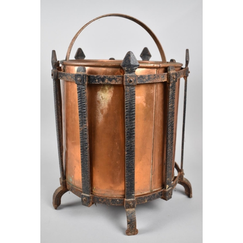 107 - A Wrought Iron Circular Stand Containing Copper Coal Bucket, 36.5cms HIgh