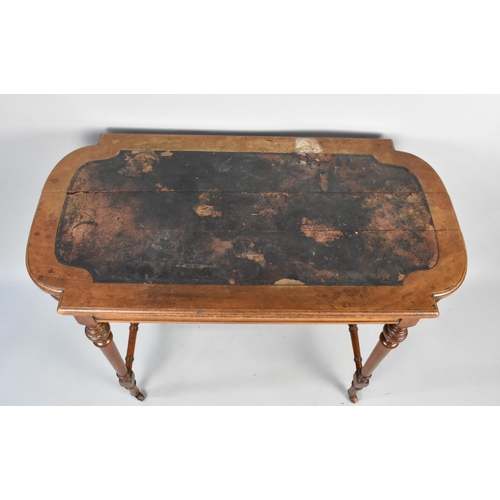 108 - An Edwardian Mahogany Writing Table with Inset Writing Surface In Need of Attention, Turned Supports... 