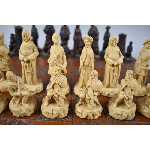 115 - A Modern Cast Chess Set with Chess Board, 45cm Square