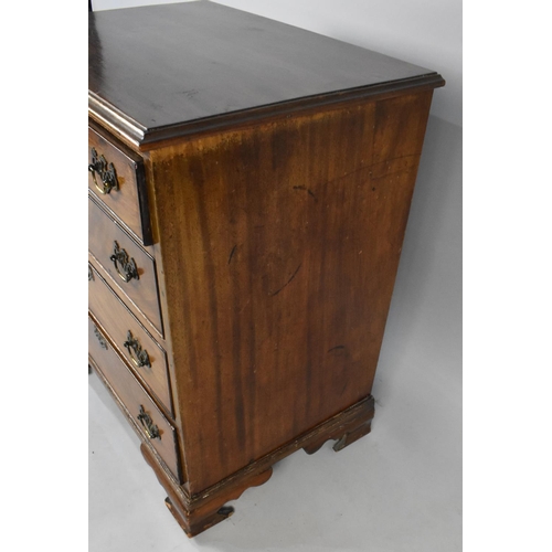 119 - An Edwardian Walnut Chest of Small Proportions Having Four Graduated Long Drawers and Ogee Bracket F... 