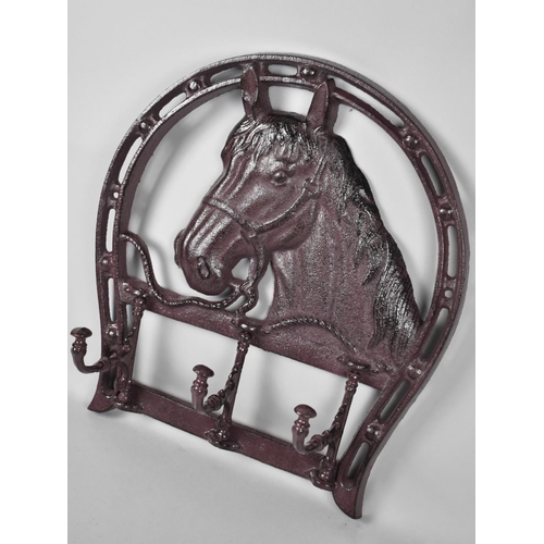 132 - A Cast Metal Wall Hanging Coat Hook with Horse Decoration, 37cms High, plus VAT