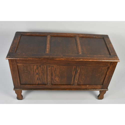 136 - A Mid 20th Century Oak Lift Top Coffer with Three Panel Front, 91cms Wide